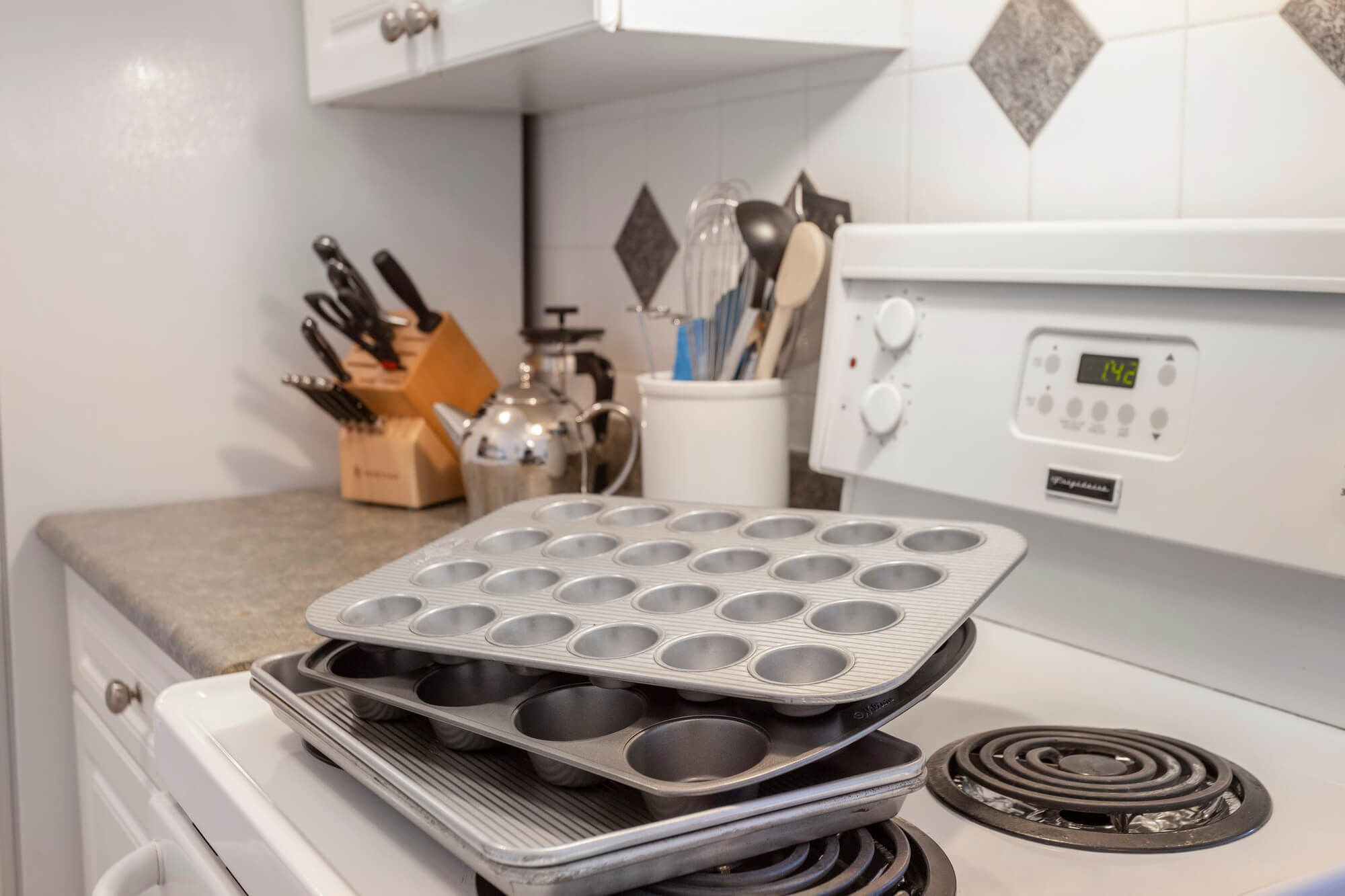 Kitchen with baking supplies in Vancouver Suite